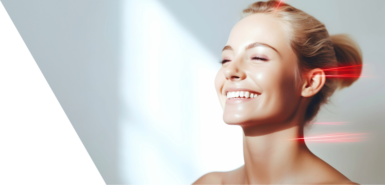 Smiling woman with glowing skin, eyes closed in joy and relaxation, with red light streaks around her head suggesting advanced skincare treatment; softly blurred background emphasizing health, wellness, and beauty.